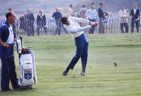 Dave Hill hits from the fairway at the 1969 Ryder Cup