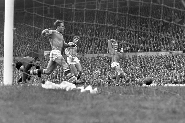 Denis Law scores the winning goal against Manchester City in 1966