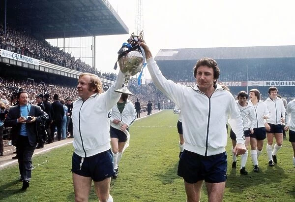 Derby Countys Roy McFarland and Francis Lee parade the League trophy in 1975