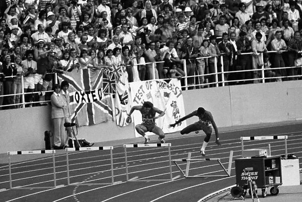 Ed Moses clatters into the hudle on his victory lap after winning gold at the 1976 Montreal Olympics