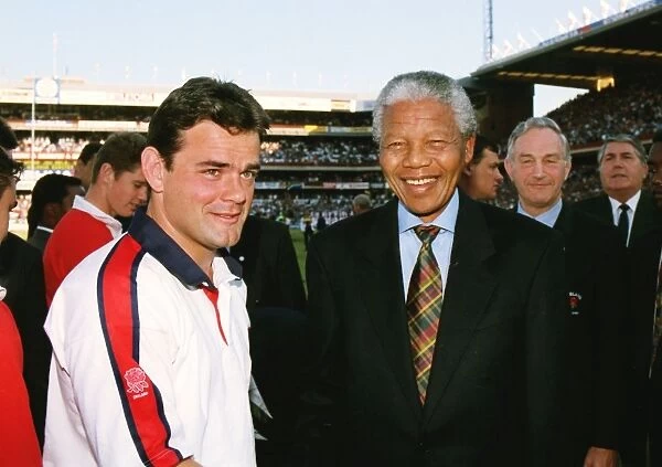 England captain Will Carling meets Nelson Mandela before the First Test against South Africa in 1994