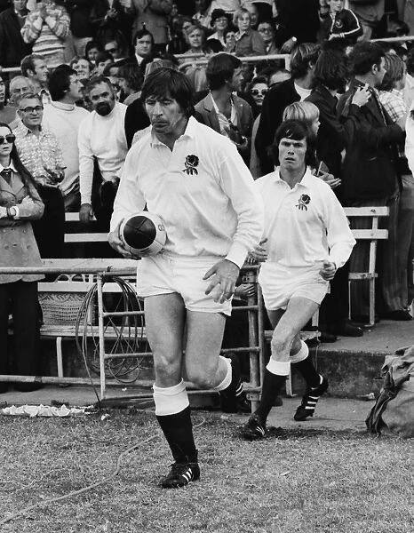 Englands captain John Pullin runs out to face Australia in 1975