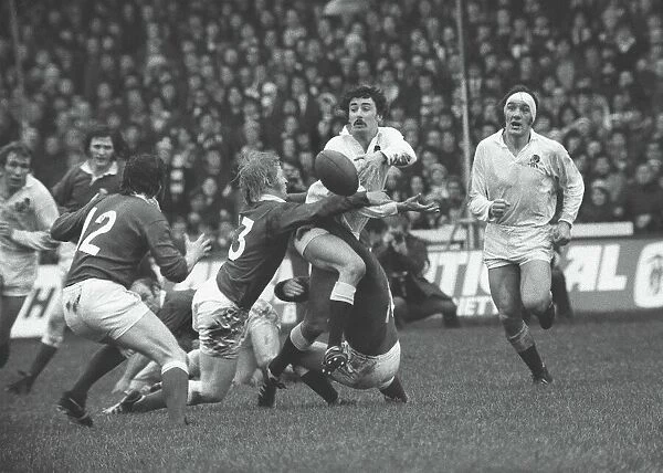 Englands Martin Cooper is tackled against Wales - 1975 Five Nations