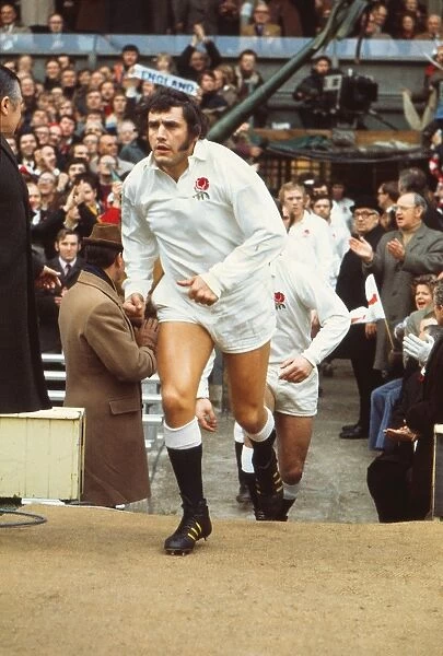 Englands Mike Burton runs out at Twickenham during the 1974 Five Nations