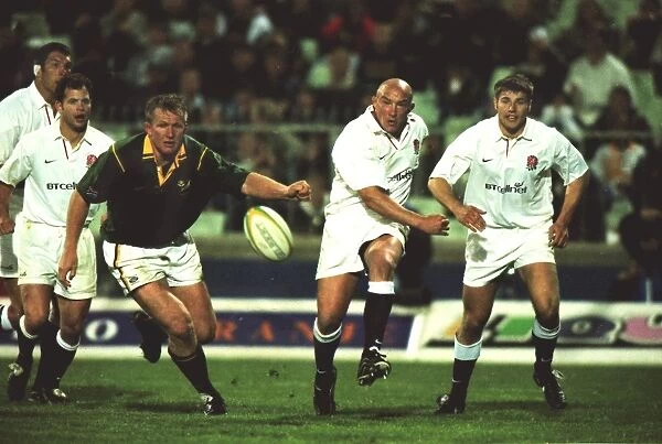 Englands Phil Greening kicks ahead against South Africa in 2000