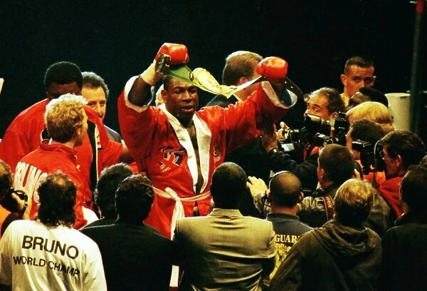 Frank Bruno celebrates winning the WBC title after defeating Oliver McCall