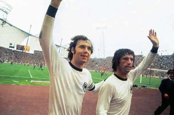Franz Beckenbauer and Gerd Muller celebrate winning the 1974 World Cup