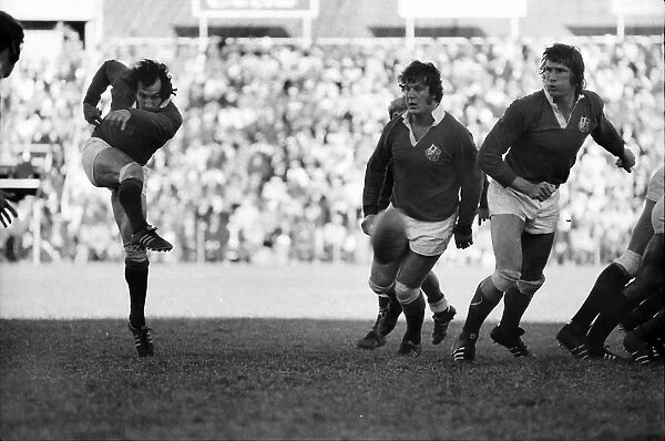 Gareth Edwards kicks ahead for the Lions in 1974
