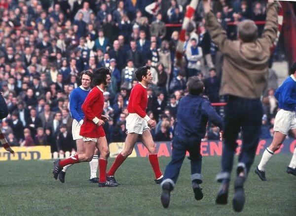 George Best and Shay Brennan run off the Old Trafford pitch after the last game of the 1968 / 9 season