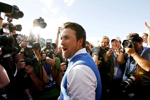 Graeme McDowell is mobbed after sinking the winning putt at the 2010 Ryder Cup