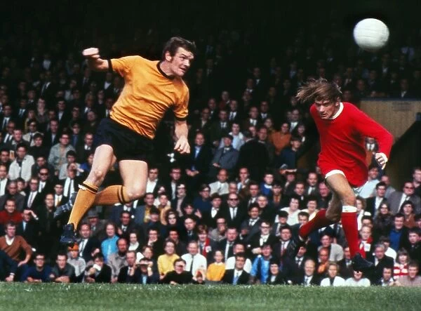 Hugh Curran of Wolves and Ian Fitzpatrick of Manchester United in 1970 / 1