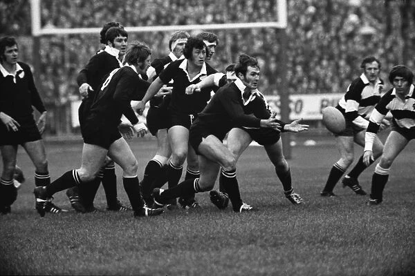 Ian Kirkpatrick passes the ball out for the All Blacks against the Barbarians in 1973