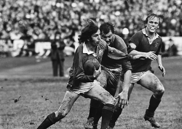 Ian McGeechan evades a tackle on the way to scoring a try - 1977 British Lions Tour to New Zealand
