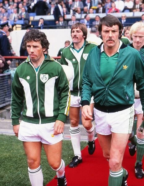 The two Ireland captains walk out in Dublin for the Euro 1980 qualifier