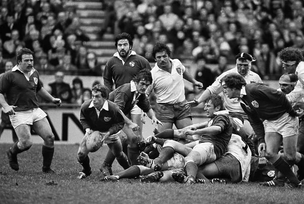 Irelands John Robbie prepares to pass the ball against France - 1981 Five Nations