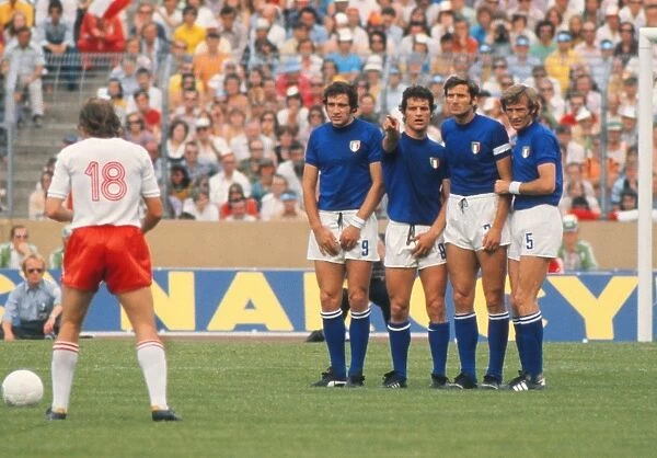 Italy players Tarcisio Burgnich, Fabio Capello, Giacinto Faccheti face a Polish free-kick at the 1974 World Cup