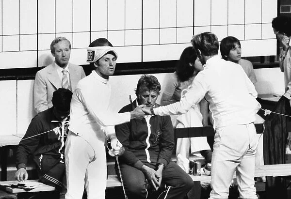 Jim Fox reluctantly shakes hands with Boris Onishchenko after their infamous fencing bout at the 1976 Montreal Olympics