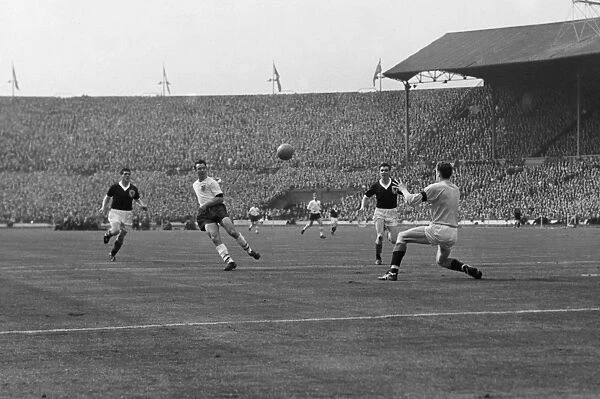 Jimmy Greaves scores against Scotland at Wembley in 1961