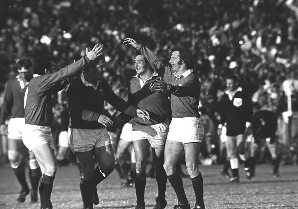 JJ Williams is congratulated by his teammates after scoring for the British Lions during the Third Test against South Africa in 1974
