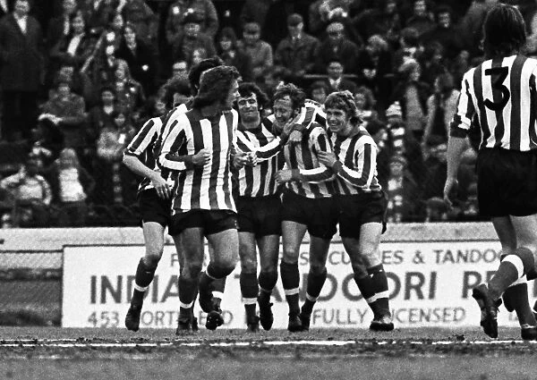 Joe Kirkup is congratulated by his Southampton teammates after scoring in 1974