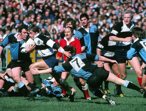 John Robbie makes a break for the Barbarians against Cardiff