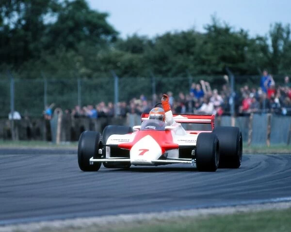 John Watson waves to the crowd after Silverstone victory 1981