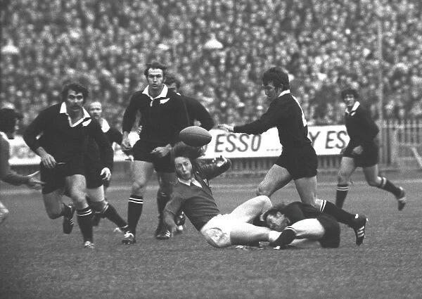JPR Williams is tackled - Wales vs. All Blacks at Cardiff, 1973