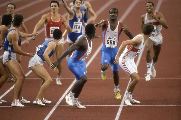 Kriss Akabusi passes the baton to John Regis as Britain win gold in the 4x400m relay at the 1990 European Championships