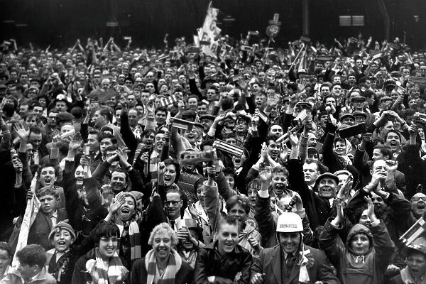 Leicester City fans celebrate their teams victory against Liverpool in the 1963 FA Cup semi-final