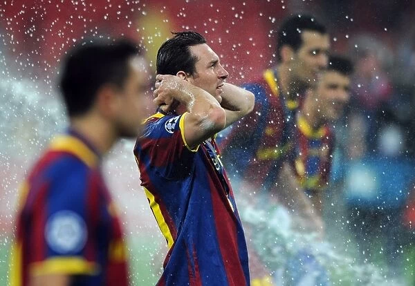 Lionel Messi cools off after the 2011 Champions League Final