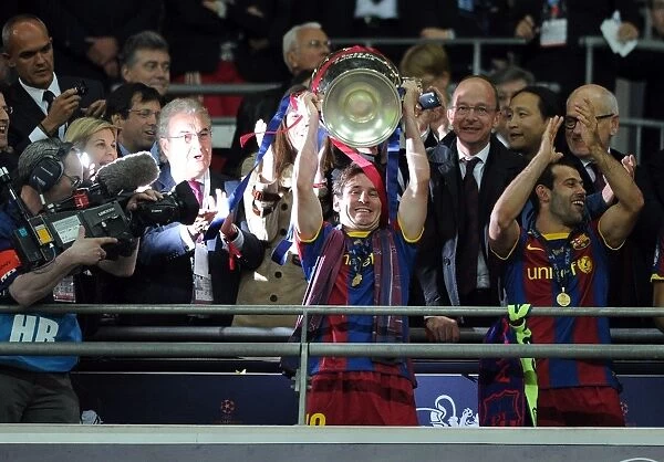 Lionel Messi lifts the 2011 Champions League Final