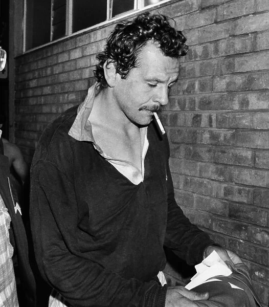 Lions captain Bill Beaumont enjoys a cigarette in the dressing room after victory over South Africa in the 4th Test in 1980