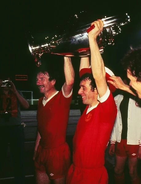Liverpools Phil Neal and Ian Callaghan celebrate victory in the 1977 European Cup Final