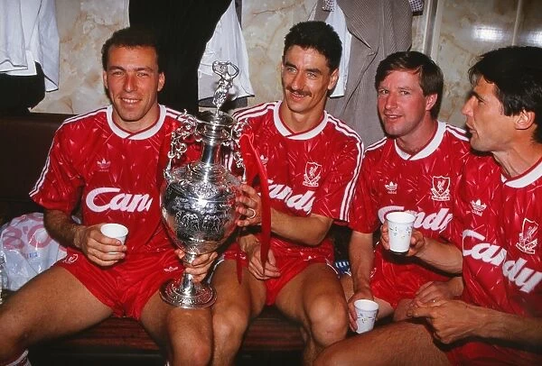 Liverpools Ronnie Rosenthal, Ian Rush, Ronnie Whelan and Alan Hansen celebrate winning the league title in 1990
