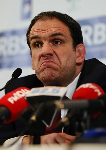 Martin Johnson faces the press after Englands defeat to Ireland at the 2011 Six Nations