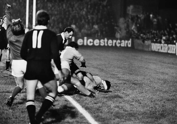 Midlands no.8 Godber Robbins scores against the All Blacks in 1983