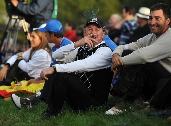 Miguel Angel Jimenez enjoys a cigar with the fans at the 2010 Ryder Cup