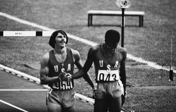 Mike Shine (silver) and Ed Moses (gold) congratulate each other after the mens 400m hurdles final at the 1976 Montreal Olympics