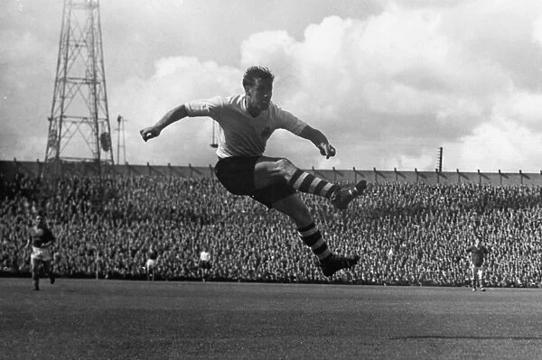 Nat Lofthouse scores against Leeds United in 1958