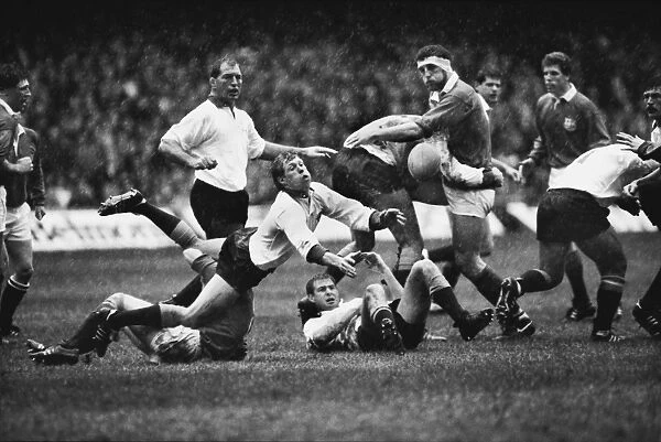 Nick Farr-Jones passes the ball for The Rest against the British Lions in 1986