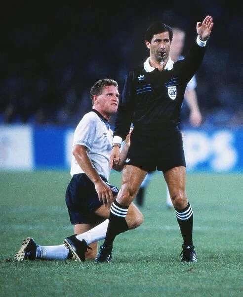 Paul Gascoigne looks furious as the referee ignores his appeal for a foul at Italia 90
