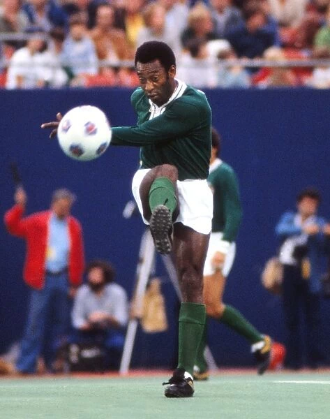 Pele plays a pass in his farewell game