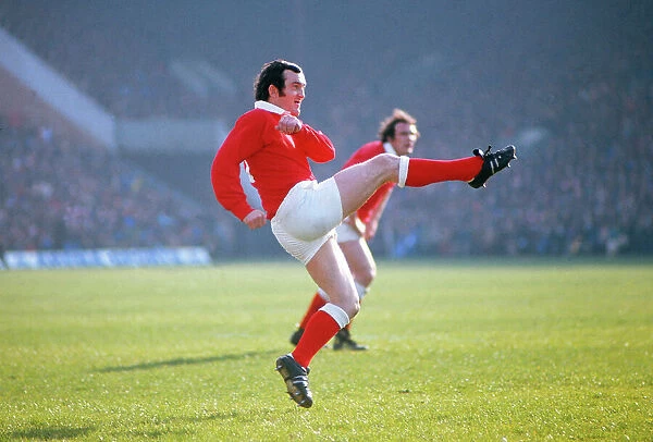 Phil Bennett kicks to touch during the 1977 Five Nations