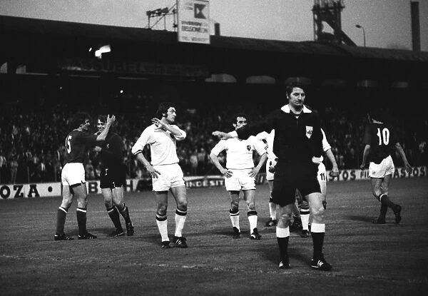 The referee awards a penalty during the third-place play-off at Euro 72