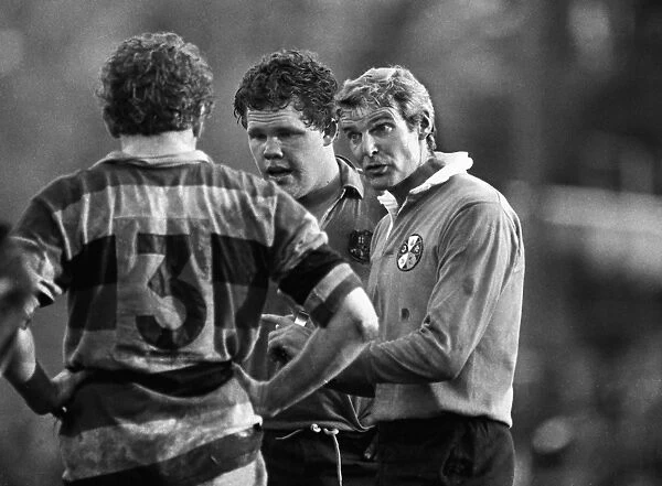Referee Roger Quittenton talks to the forwards during Pontypools 1981 game with Australia