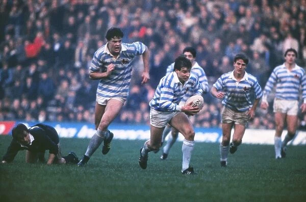 Rob Andrew makes a break during the 1984 Varsity Match