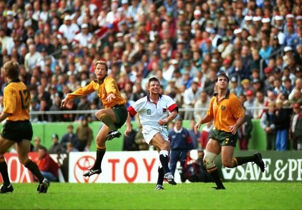 Rob Andrew watches his game-winning drop-goal sail through the posts in the 1995 Rugby World Cup quarter-final against Australia