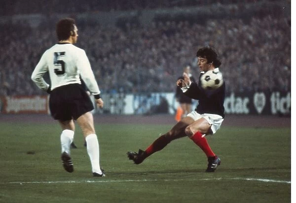 Scotlands Willie Morgan and West Germanys Franz Beckenbauer