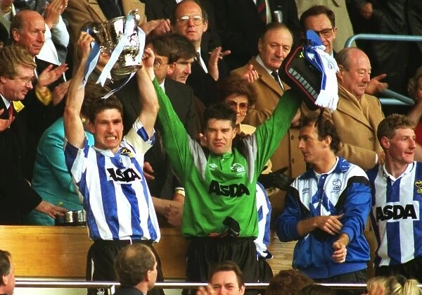 Sheffield Wednesday captain Nigel Pearson holds aloft the League Cup in 1991 with goalkeeper Chris Turner