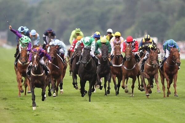 Simenon ridden by Ryan Moore, leads the Ascot Stakes - Royal Ascot 2012